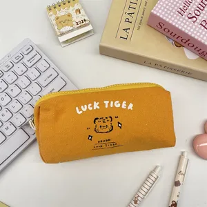 Cute yellow canvas pencil case with tiger print, simple stationery storage bag and portable cosmetic pouch.