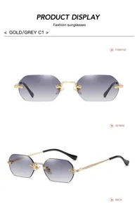 Fashion polygonal rimless sunglasses for men and women, gold frame with grey gradient lenses.