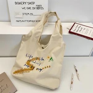 Canvas shoulder tote bag, large capacity casual aesthetic canvas bag with letter print.
