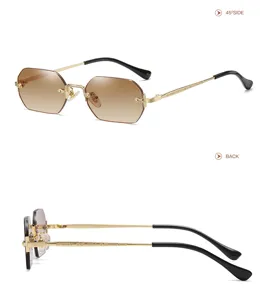 Polygonal rimless sunglasses with gradient brown lenses and ornate gold metal temples.