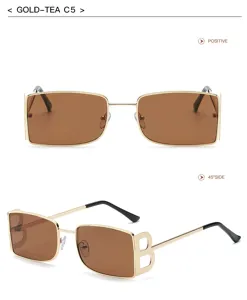 Vista detallada de gafas de sol vintage, montura de metal dorada, lentes marrones, detalle B.