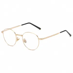Retro round metal anti-blue light glasses for men and women, stylish optical clear eyewear.