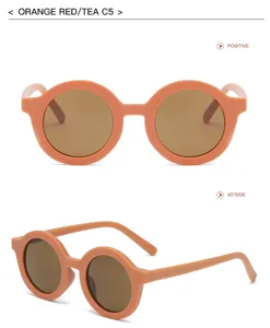 Occhiali da sole rotondi bambini dettaglio, montatura arancione rossa lenti tè, moda e protezione.