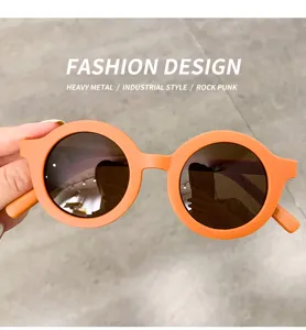 Detail shot of cream matte round sunglasses, stylish thick frame retro punk eyewear accessory.