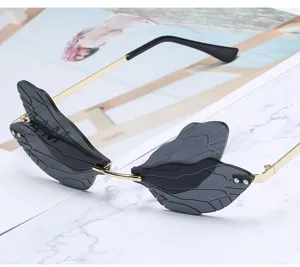 Schicke Libellenflügel Sonnenbrille für Damen, modischer Metallrahmen randlose Sonnenbrille.