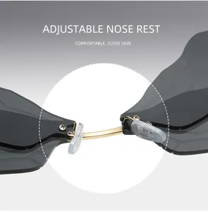 Detaillierte Nahaufnahme der verstellbaren Nasenauflage und des Metallstegs an Sonnenbrille.