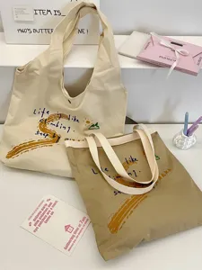 Canvas tote bag for women, casual shoulder bag with letter print, large capacity daily use.