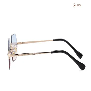 Fashionable polygonal rimless sunglasses for women and men, trendy gradient lenses with gold metal frames.