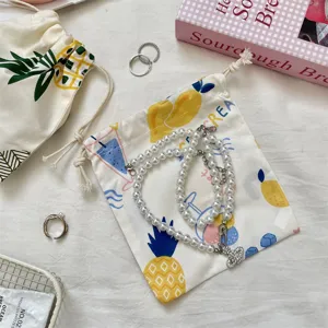 Petit sac de rangement en toile avec cordon, sachet anti-poussière portable et utile.