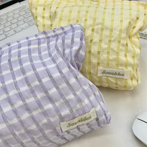 Cute pastel plaid cosmetic bag portable travel makeup pouch storage organizer for daily use.