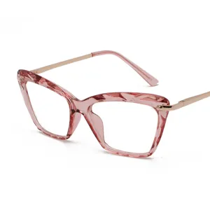 Trendy fashion butterfly optical glasses frame with pink resin and gold metal temples.