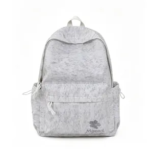 Grey nylon school backpack detail showing front pocket, embroidery design, and large capacity.