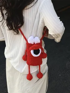 Handmade knitted cute monster phone bag, trendy crossbody shoulder bag for women and kids.