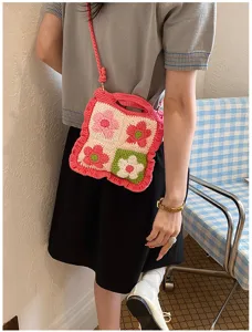Handgemaakte gehaakte bloemen schoudertas voor dames, stijlvolle gebreide handtas.