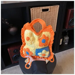 Borsa a mano crochet in maglia floreale da donna, borsa a tracolla colorata chic.