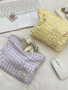 Grid makeup bag portable cosmetic storage pouch cute toiletry organizer for women daily use.
