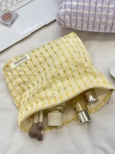 Yellow plaid cosmetic bag portable makeup pouch travel toiletry organizer with zipper.