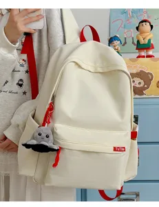 Korean style minimalist solid color large capacity backpack school bag for students and women.
