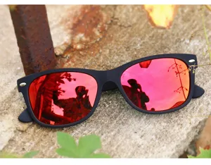 Classic black frame sunglasses with vibrant red reflective lenses, retro square design for daily wear.