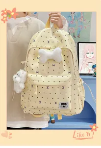 Süßer Cartoon großer Kapazität Studentenrucksack, gepunktetes Design mit Plüschschleife für Schule.