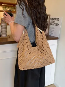 Handmade hollow knitted hobo shoulder bag for women, retro casual beach tote bag brown.