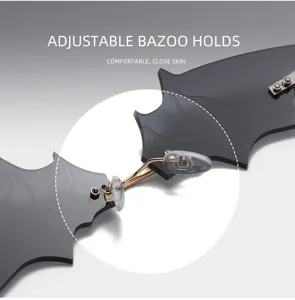 Gothic vampire bat wing sunglasses rimless metal nose bridge fashion cool eyewear detail.