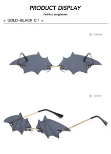 Gothic bat wing rimless sunglasses for men and women, cool vampire fashion eyewear detail.
