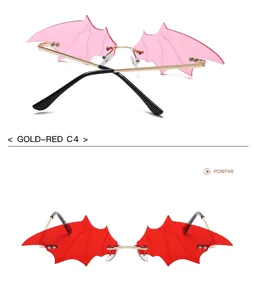 Bat wing rimless sunglasses detail view, gothic fashion sun glasses, unique styling eyewear.
