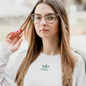 Stylish half-metal frame anti-blue light glasses with trendy leopard print rim for use.