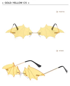 Bat wing rimless sunglasses in gold yellow, trendy novelty eyewear for men and women street style.