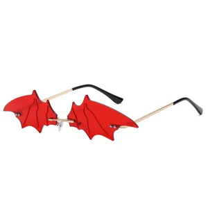 Red bat wing sunglasses fashion rimless vampire novelty glasses for men and women street wear