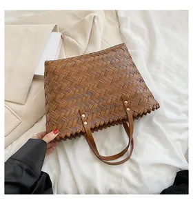 Close-up of the stylish brown woven texture tote bag showing intricate craftsmanship and details.