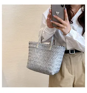 Grey woven straw tote bag for women, stylish casual shoulder handbag for daily use.