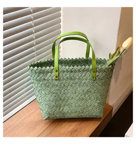 Korean style green woven tote bag for women, chic straw shoulder handbag with top handle.
