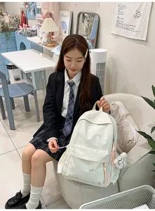 Mochila bonita con bordado de lazos para mujer gran capacidad bolso escolar diario