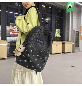 Stylish star denim corduroy patchwork school backpack for girls, large capacity student bag.