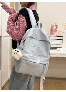Sac à dos bleu clair avec motif d'étoiles, grande capacité, cartable décontracté pour fille.