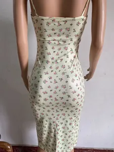 Back view detail of women summer floral slip dress, elegant spaghetti strap yellow dress.