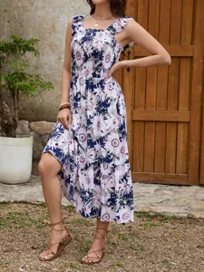 Beautiful floral print smocked bodice with ruffle sleeves maxi dress outdoor view.
