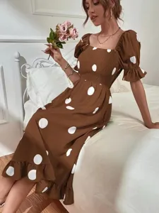 Detailed view of women short sleeve square neck polka dot midi dress with elegant ruffled hem.
