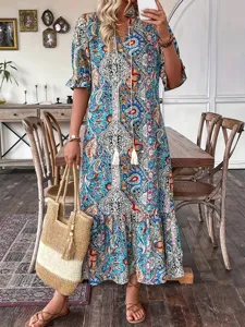 Autumn bohemian floral print midi dress with V-neck, drawstring tassels, and ruffle hem.