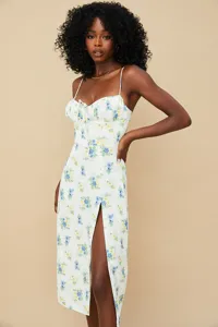 Detailed view of women's floral print slip dress with chic front slit and sweet strap design.