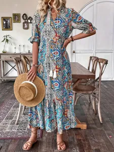 Boho paisley print dress detail, V-neck with tassel ties, elegant half sleeves, fall style.