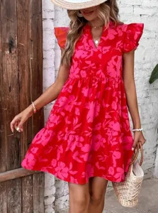 Close-up detail view of the floral print V-neck ruffle sleeve summer dress on model outdoors.