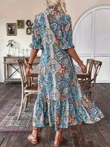 Boho paisley print maxi dress featuring ruffled hem, mid sleeves, and stylish autumn design.