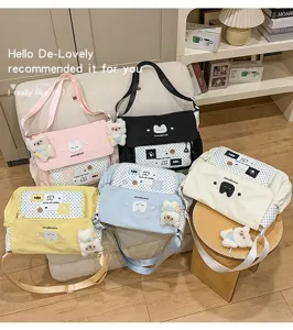 Cute canvas messenger bag for students, multi-color cute crossbody bag with bear pendant.