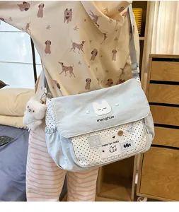 Cute polka dot canvas messenger bag for students, stylish crossbody shoulder bag with cat.