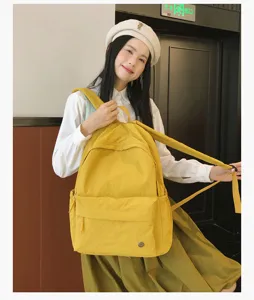 Sac à dos d'école décontracté couleur bonbon pour femmes style collège sac de jour