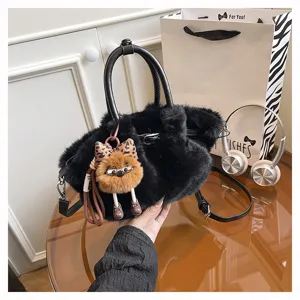 Fashionable autumn winter plush pleated soft commuting bucket bag for women with cute deco.