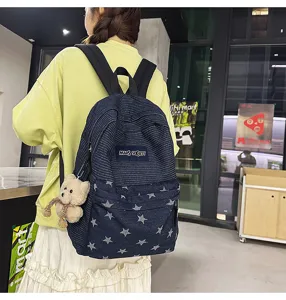 Stylish star pattern denim backpack for students, large capacity casual daypack with cute bear.